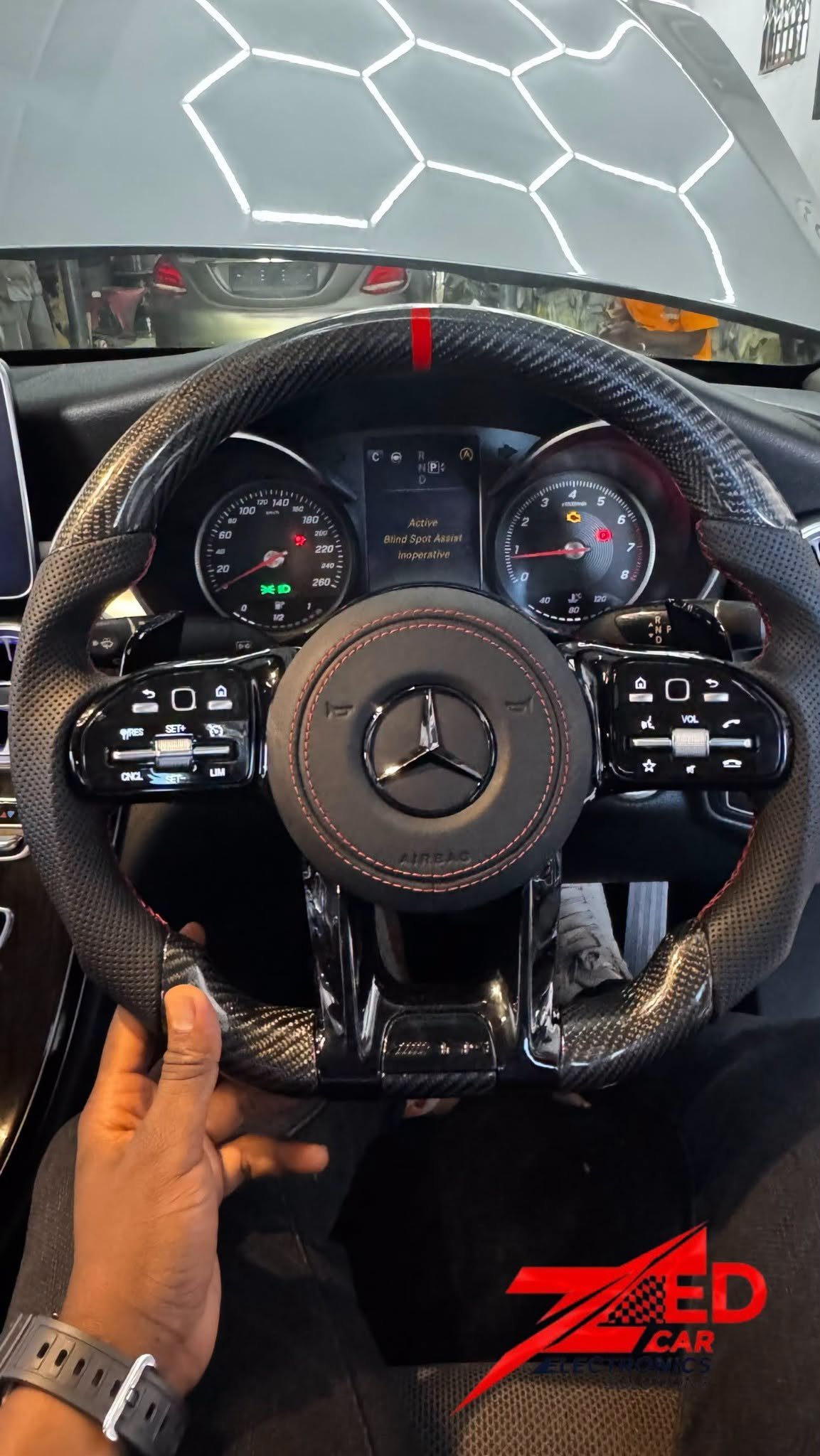 Carbon fibre steering wheel wrap installation